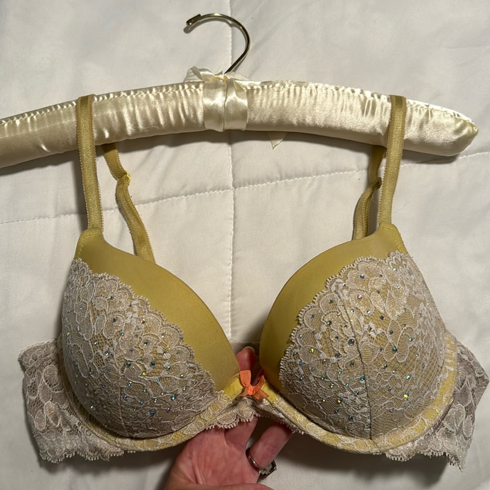 Victoria Secret yellow bra, white lace with gem stones